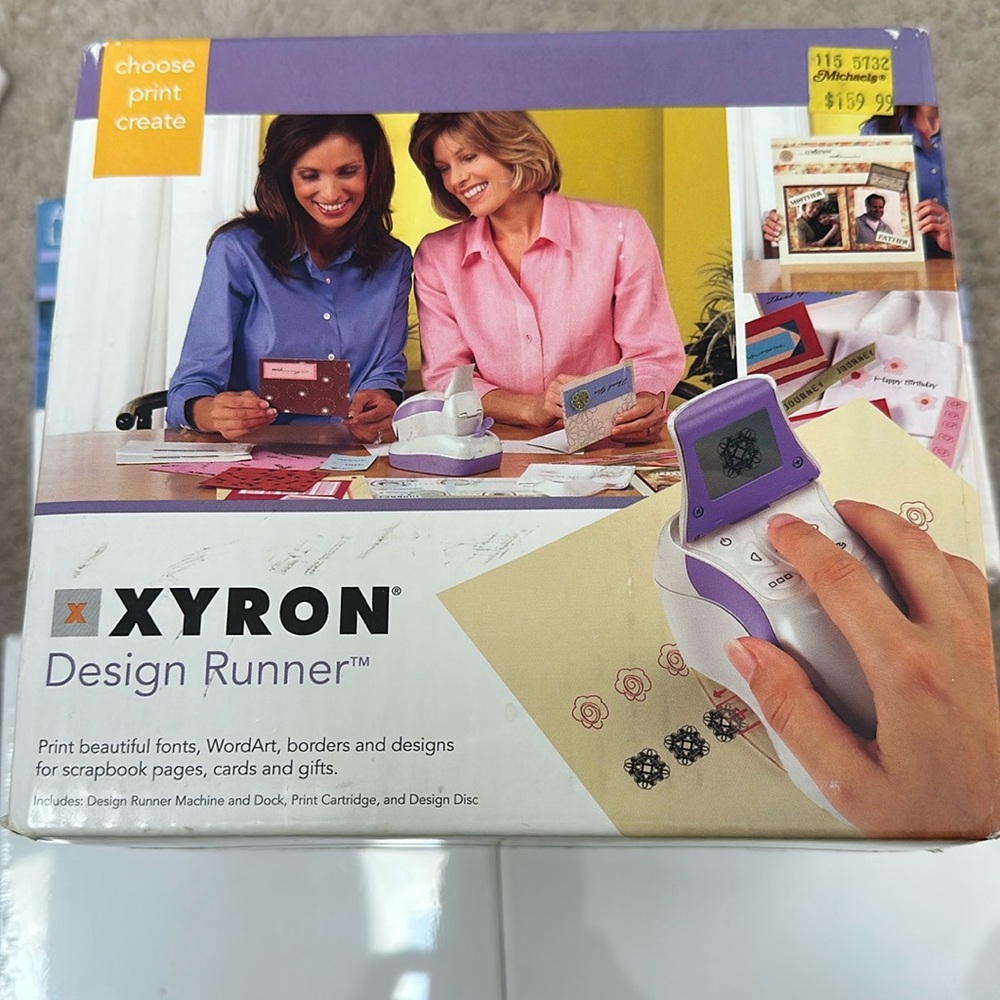 new unopened Xyron Design Runner Handheld Cordless Printer